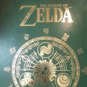 The Legend of Zelda Hyrule Historia. Hard bound book detailing the origins Zelda